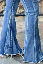 Load image into Gallery viewer, Light Blue Acid Wash Raw Hem Flared Jeans